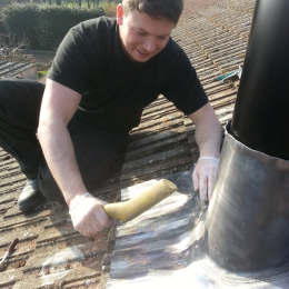 Installing new lead flashing around a chimney