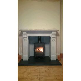 Carrara marble Nuffield mantel and honed granite hearth