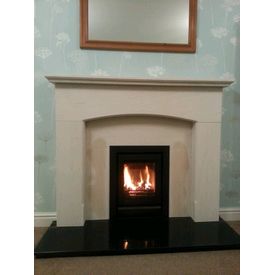 Stovax Riva 40 cassette with a portuguese limestone surround