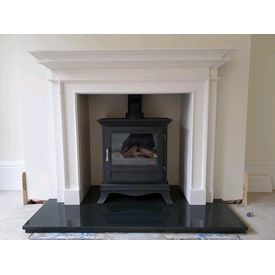 Chesneys Beaumont gas stove. Aegean limestone mantel. Black polished granite hearth. 