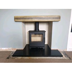 Classic antique style non combustible geocast beam. Heta inspire 45 5kw multifuel stove. 