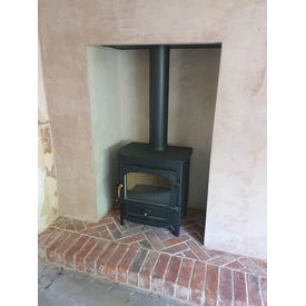 Clearview Vision 500 8kw multifuel stove. Brick herringbone hearth. 