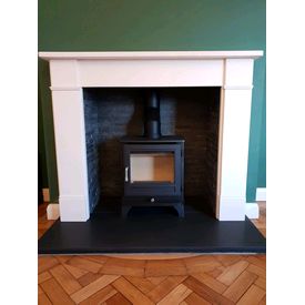 Chesneys salisbury woodburner with a riven slate chamber set, aegean limestone mantel and honed granite hearth 